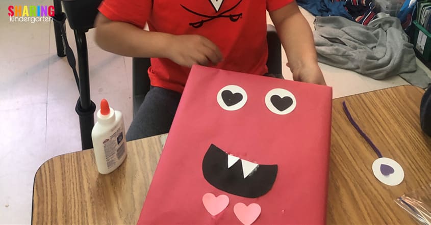 Use simple hole punched shapes to make these Valentine boxes.